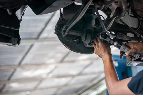 Mot Test Repair Mechanic working at McMullan Auto Services Armagh workshop